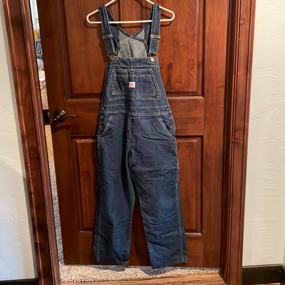 Women’s size large blue jean overalls. Cargo style. Worn once.